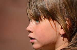 Girl soaking wet - with tears?